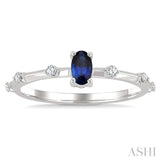 1/10 Ctw 5X3MM Oval Cut Sapphire and Floating Round Cut Diamond Precious Ring in 10K White Gold