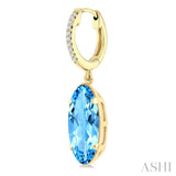 12X5 MM Oval Shape Blue Topaz and 1/10 Ctw Round Cut Diamond Semi-Precious Earrings in 10K Yellow Gold
