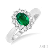 7X5mm Oval Shape Emerald and 1/3 Ctw Round Cut Diamond Ring in 14K White Gold