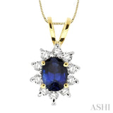 7x5MM Oval Cut Sapphire and 1/3 Ctw Round Cut Diamond Pendant in 14K Yellow Gold with Chain