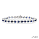 1 Ctw Round Cut Diamond & 4x3 MM Oval Cut Sapphire Precious Bracelet in 14K White Gold