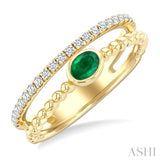 4x3 MM Oval Shape Emerald and 1/5 Ctw Round Cut Diamond Precious Fashion Split Twin Ring in 10K Yellow Gold