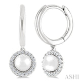 5.5 MM Round Shape Cultured Pearl and 1/8 Ctw Petite Round Cut Diamond Halo Fashion Huggies in 10K White Gold
