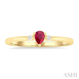 4x3 MM Pear Shape Ruby and 1/50 Ctw Petite Round Cut Diamond Fashion Ring in 10K Yellow Gold