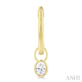 1/3 Ctw Bezel Set Oval Cut Diamond Huggie Earrings in 14K Yellow Gold